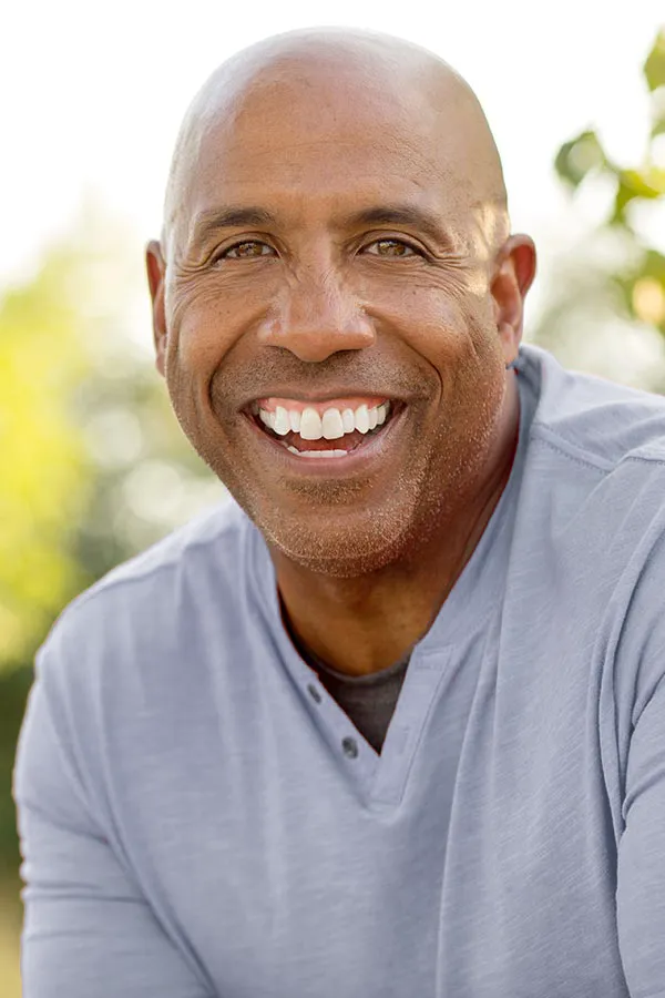 A smiling man. Get BioTE Testosterone Pellet Therapy for Men from ProCare Wellness Institute in Virginia Beach.