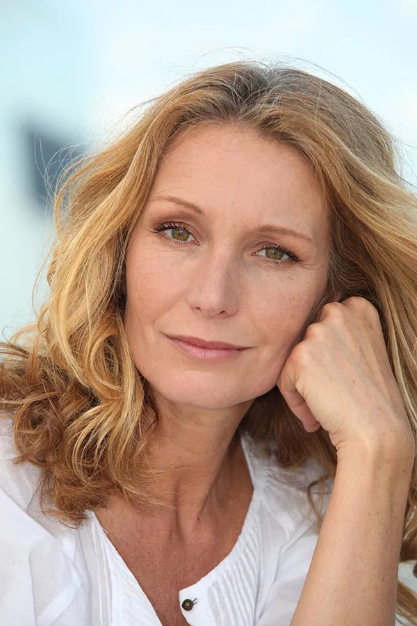 A beautiful middle-aged woman. Get BioTE Testosterone Pellet Therapy for Women from ProCare Wellness Institute in Virginia Beach.