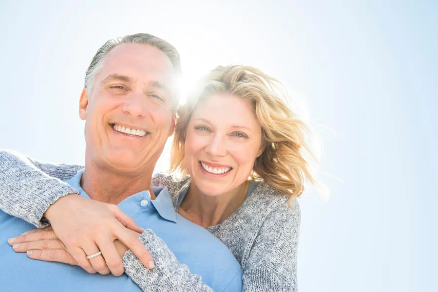 Radiofrequency-Microneedling-for-Age-Spots-Sun-Damage-Specialist A couple with clear radiant skin. Get Radiofrequency Microneedling for Age Spots from ProCare Wellness Institute in Virginia Beach.