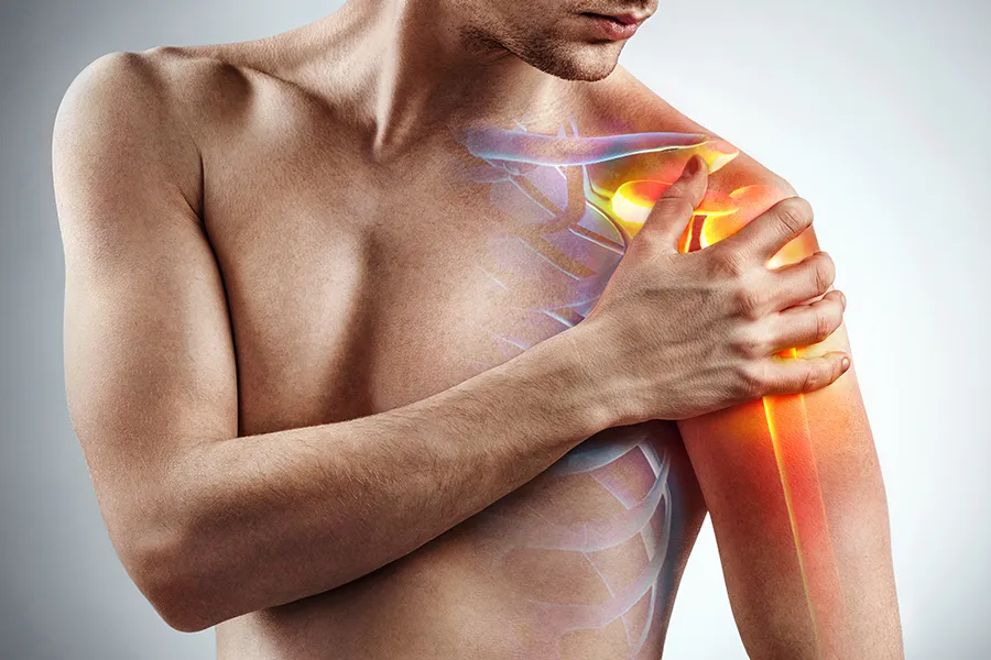 A man holds his shoulder; a 3D illustration of the musculo-skeletal shoulder is on the area. Get rotator cuff treatment from ProCare Wellness Institute in Virginia Beach.